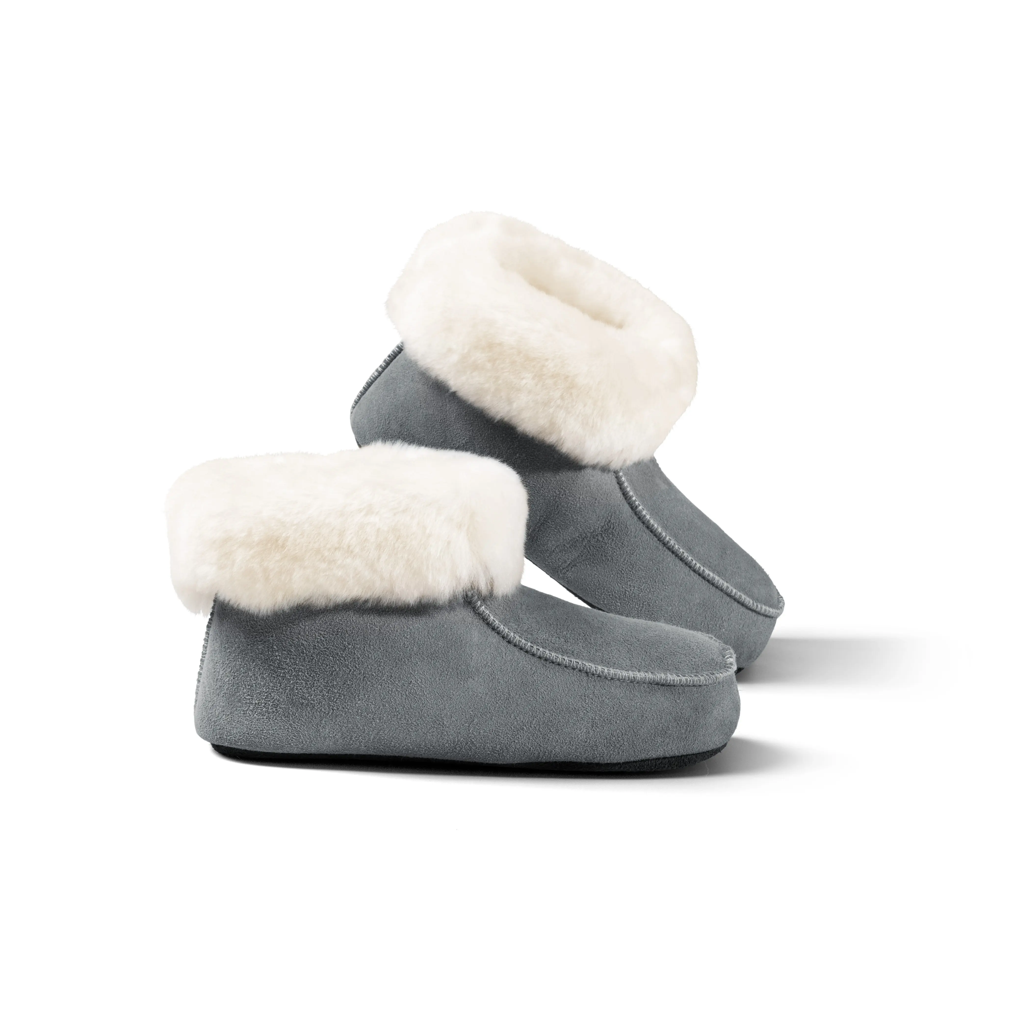 Kids lambskin slipper boots with leather soles color blue