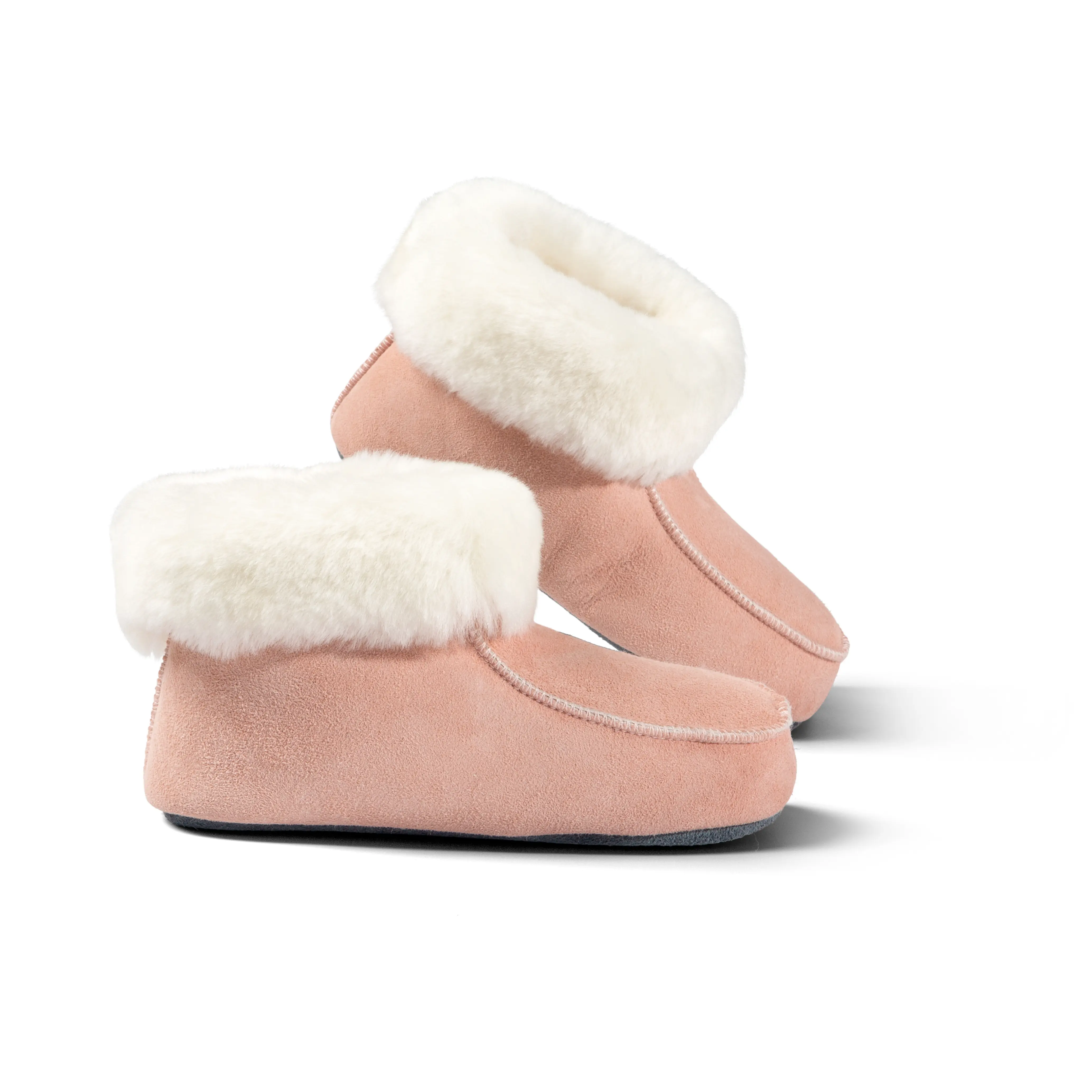 Kids lambskin slipper boots with leather soles color pink